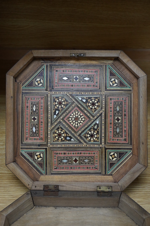 A 20th century Damascus ware heavily inlaid box, 31cm x 31cm. Condition - ball foot missing, inlay good